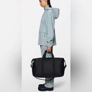 NEW RAINS Hilo Weekend Bag in Black Waterproof